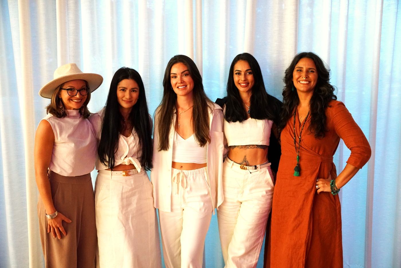 Women together at a Becoming HER gathering